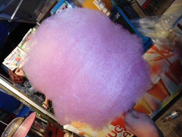 cotton candy, pink, hand